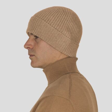 This 3-ply Unisex cashmere beanie features a classic ribbed knit design, offering a snug fit and a luxuriously soft texture, available in a range of rich, elegant colours
