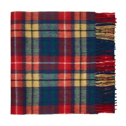 Featuring a rich tartan pattern, this 2-ply Lambswool scarf drapes gracefully with a classic check design and a subtle texture, available in a variety of traditional tartans.