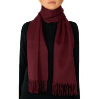 Showcasing a smooth, solid colour, this 2-ply Lambswool scarf offers a clean, streamlined look with a gently textured surface, available in a range of elegant plain colours