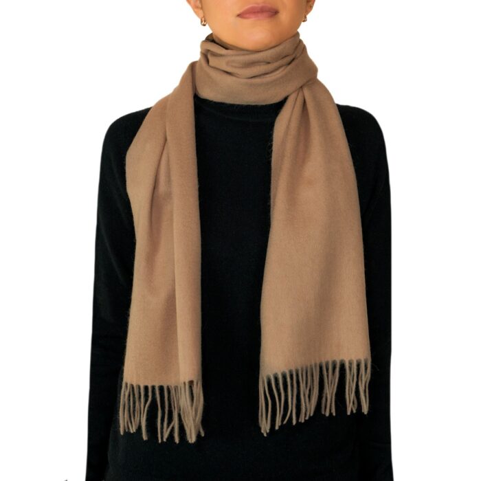 Showcasing a smooth, solid colour, this 2-ply Lambswool scarf offers a clean, streamlined look with a gently textured surface, available in a range of elegant plain colours