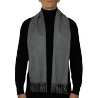 Showcasing a smooth, solid colour, this 2-ply Lambswool scarf offers a clean, streamlined look with a gently textured surface, available in a range of elegant plain colours