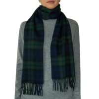 Featuring a rich tartan pattern, this 2-ply Lambswool scarf drapes gracefully with a classic check design and a subtle texture, available in a variety of traditional tartans