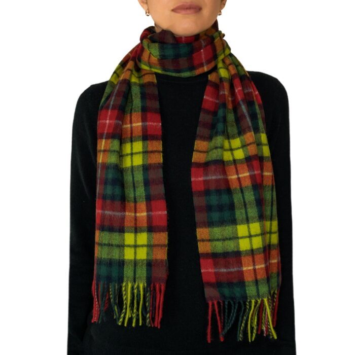 Featuring a rich tartan pattern, this 2-ply Lambswool scarf drapes gracefully with a classic check design and a subtle texture, available in a variety of traditional tartans