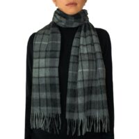 Featuring a rich tartan pattern, this 2-ply Lambswool scarf drapes gracefully with a classic check design and a subtle texture, available in a variety of traditional tartans