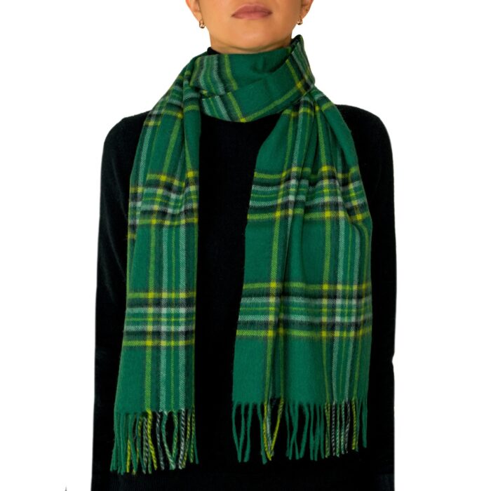 Featuring a rich tartan pattern, this 2-ply Lambswool scarf drapes gracefully with a classic check design and a subtle texture, available in a variety of traditional tartans