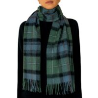 Featuring a rich tartan pattern, this 2-ply Lambswool scarf drapes gracefully with a classic check design and a subtle texture, available in a variety of traditional tartans