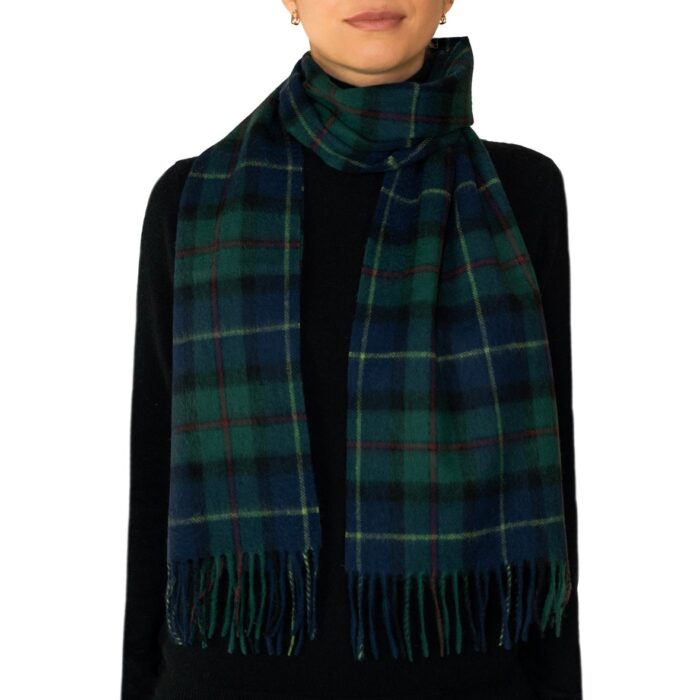 Featuring a rich tartan pattern, this 2-ply Lambswool scarf drapes gracefully with a classic check design and a subtle texture, available in a variety of traditional tartans