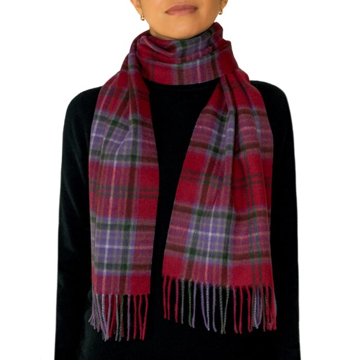 Featuring a rich tartan pattern, this 2-ply Lambswool scarf drapes gracefully with a classic check design and a subtle texture, available in a variety of traditional tartans