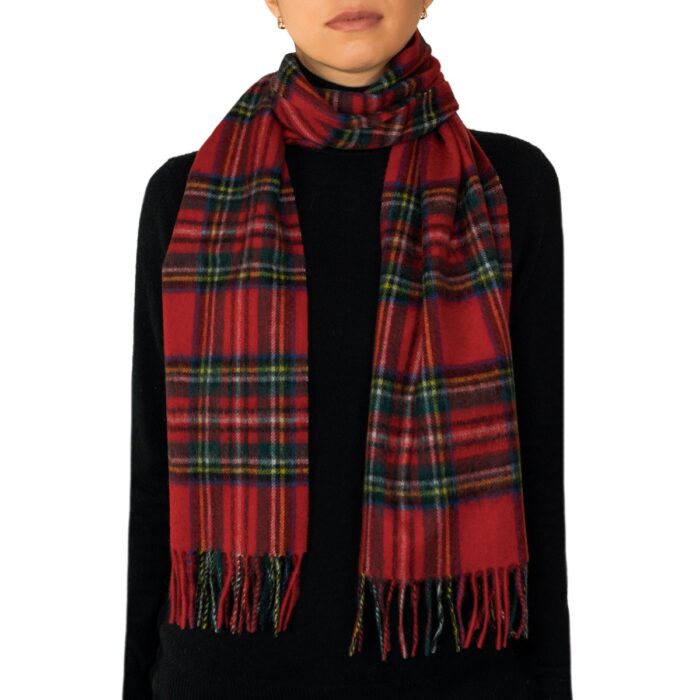 Featuring a rich tartan pattern, this 2-ply Lambswool scarf drapes gracefully with a classic check design and a subtle texture, available in a variety of traditional tartans