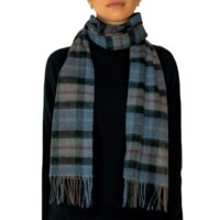 Featuring a rich tartan pattern, this 2-ply Lambswool scarf drapes gracefully with a classic check design and a subtle texture, available in a variety of traditional tartans