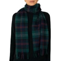 Featuring a rich tartan pattern, this 2-ply Lambswool scarf drapes gracefully with a classic check design and a subtle texture, available in a variety of traditional tartans