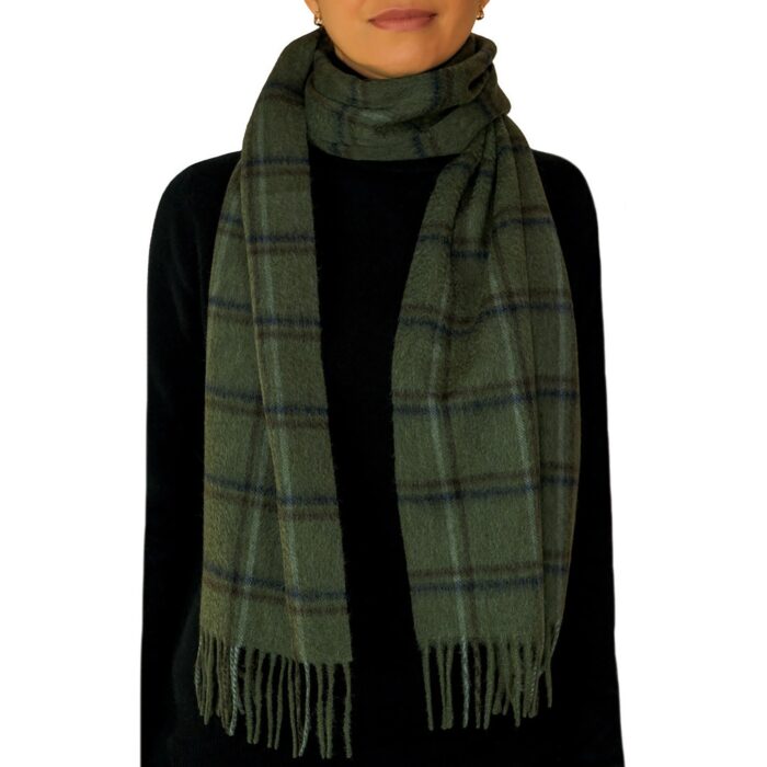 Featuring a rich tartan pattern, this 2-ply Lambswool scarf drapes gracefully with a classic check design and a subtle texture, available in a variety of traditional tartans