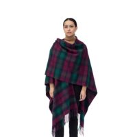 Model Wearing a Women's Lambswool Ruana Cape, a soft lambswool cape in a Lindsay Tartan