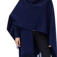 Model wearing Lona Scott Women's Lambswool Ruana Cape, a soft lambswool cape in a Navy