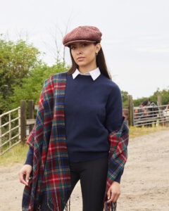 Model wearing Lona Scott Lambswool Shawl in Black Stewart Tartan
