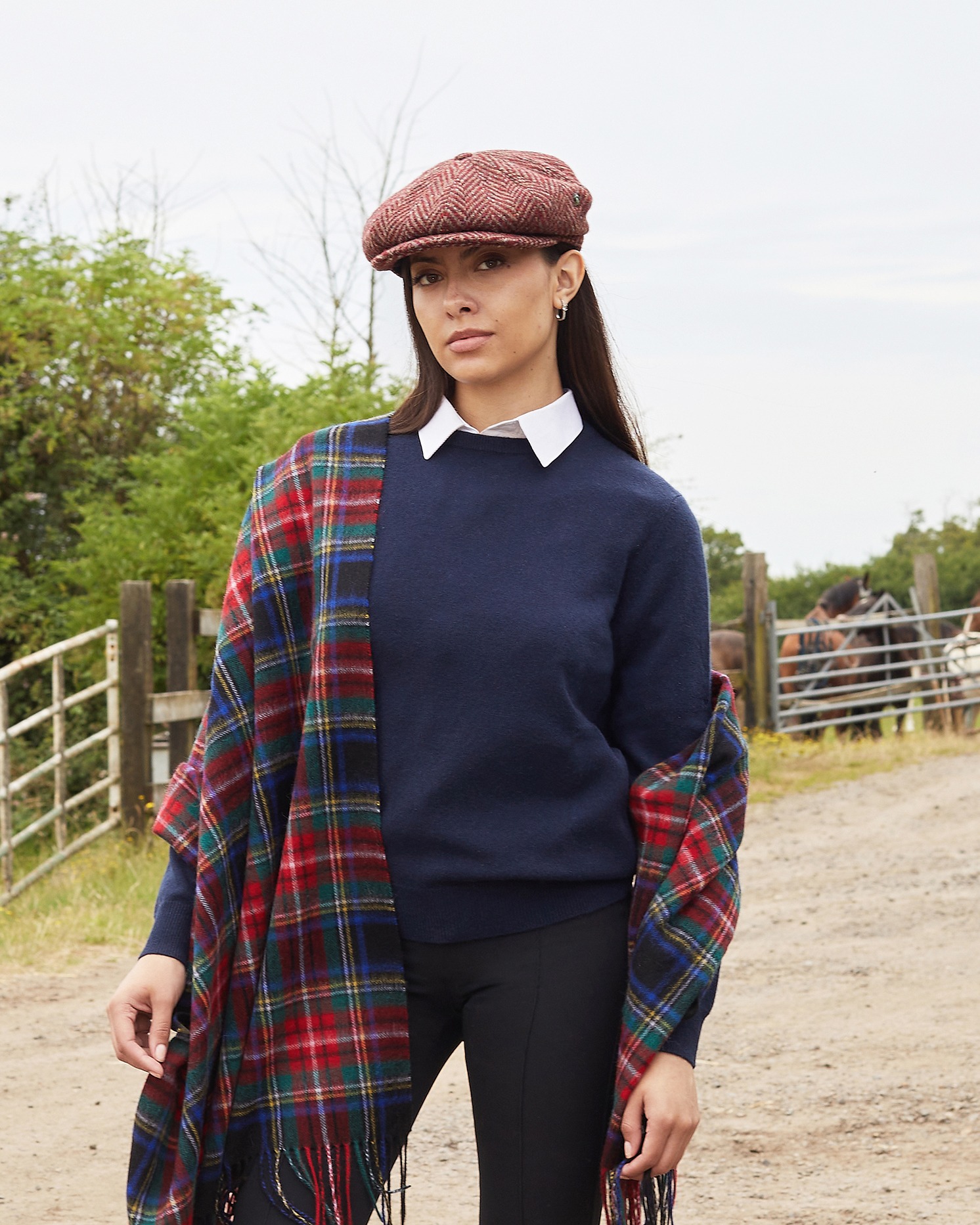 Model wearing Lona Scott Lambswool Shawl in Black Stewart Tartan