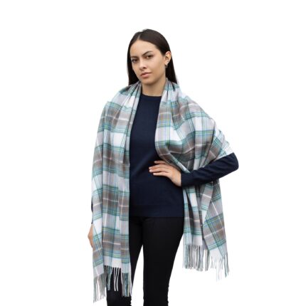 A super-soft and elegant 100% lambswool shawl, available in tartan and plain designs. Lightweight, warm, and versatile, perfect for stylish layering in any season