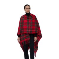 Model wearing Lona Scott Women's Lambswool Ruana Cape, a soft lambswool cape in a Royal Stewart Tartan