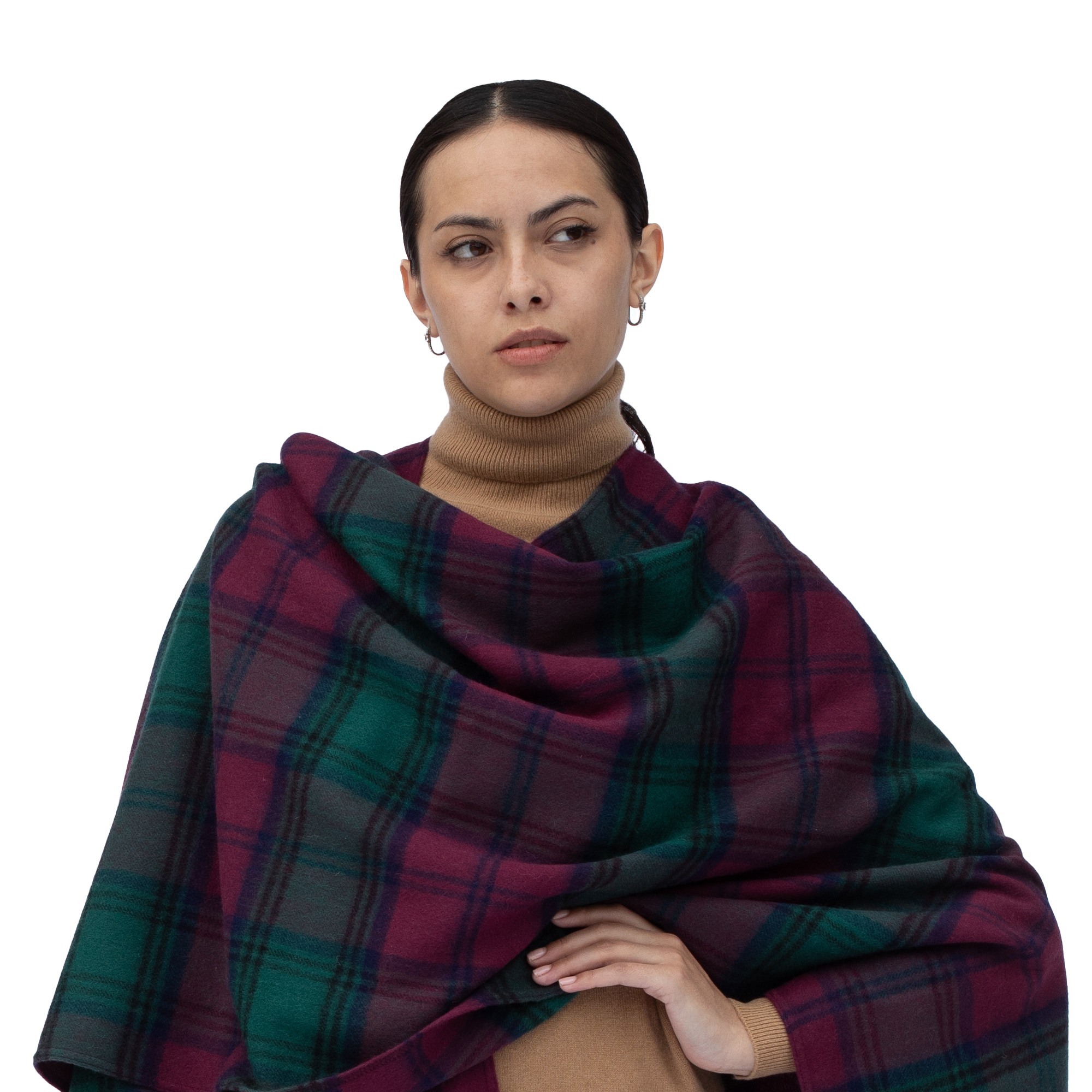 Model wearing Lona Scott Women's Lambswool Ruana Cape, a soft lambswool cape in Lindsay Tartan