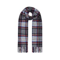 A super-soft and elegant 100% lambswool shawl, available in tartan and plain designs. Lightweight, warm, and versatile, perfect for stylish layering in any season, featured in Grey Stewart