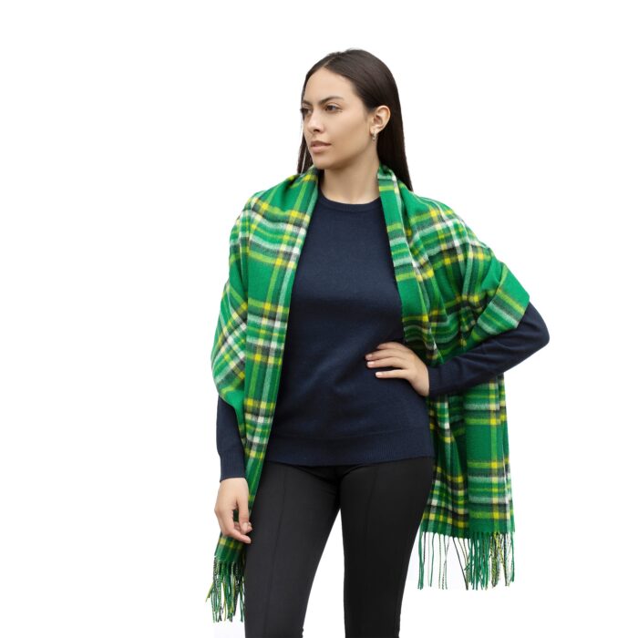 Model wearing Lona Scott Lambswool Shawl in Irish National Tartan print