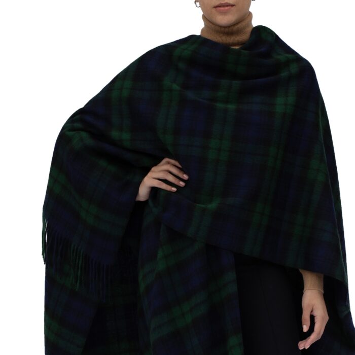 Model wearing Lona Scott Women's Lambswool Ruana Cape, a soft lambswool cape in Black Watch