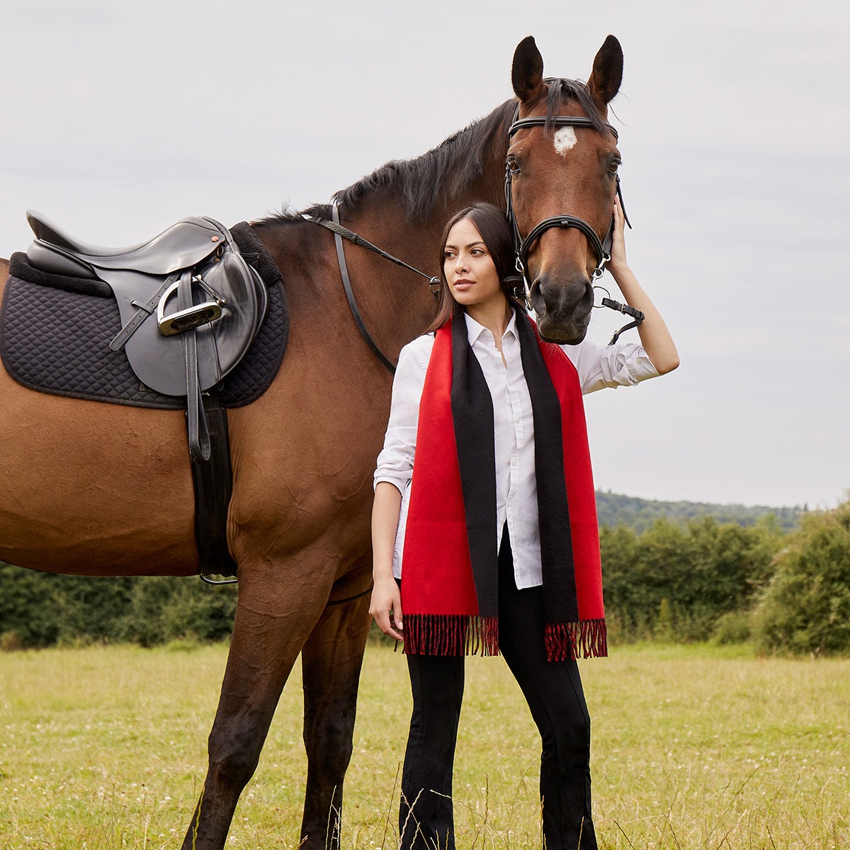Reversible Soft Cashmere Scarf, from our new collection, model wearing the reversible black & red scarf